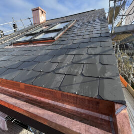 Eternit Dach mit Kupfer